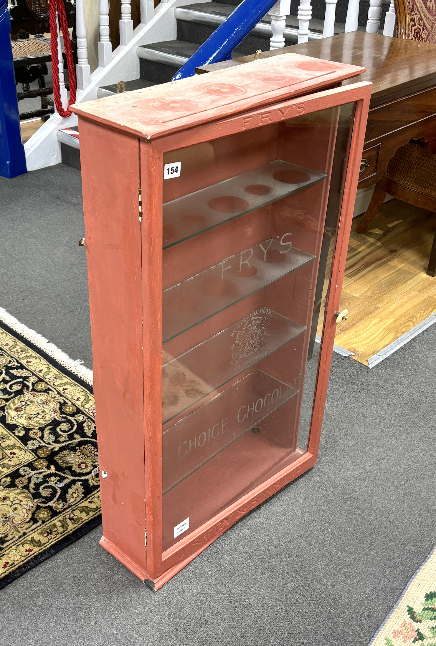 A Frys 'Choice Chocolate' display cabinet, later painted, width 54cm, depth 17cm, height 93cm